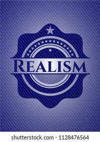 Realism badge with denim background