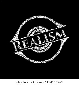 Realism chalk emblem written on a blackboard