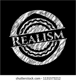 Realism chalkboard emblem written on a blackboard