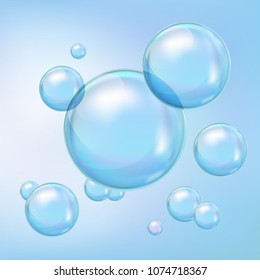 Realistic 3d bubbles in blue color. Vector design for beauty and cleansing concept. Floating soap bubbles.