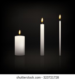 Realistic 3d candle set on a dark background. Vector EPS10 illustration.  