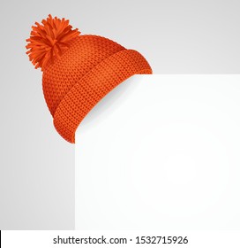 Realistic 3d Detailed Red Knitted Hat with a Pompom on a Corner White Sheet of Paper for Ad. Vector illustration