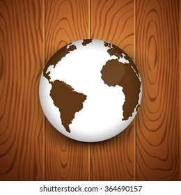 Realistic 3D globe icon of the world map on wooden background