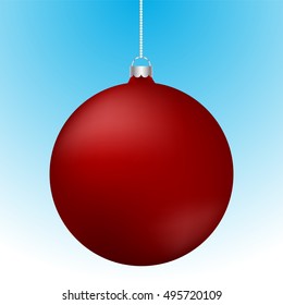 Realistic 3D red christmas ball decoration hanging on white chain. Rounded red ball decoration with reflections on blue to white gradient backdrop.