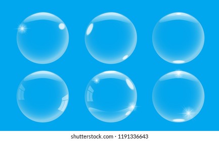 Realistic 3d soap bubble with on blue background. Vector Soap Bubble set illustration.
