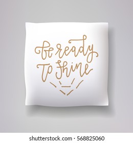 Realistic 3d throw pillow vector model with hand drawn print on a white background. Apartment interior design element. "Be ready to shine" - hand drawn lettering inscription.