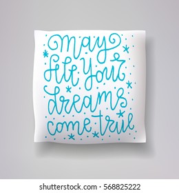 Realistic 3d throw pillow vector model with hand drawn print. Apartment interior design element. "May all your dreams come true" - hand drawn lettering inscription.