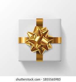 Realistic 3D White Gift with Gold Ribbons for Birthday or Christmas Celebration in White Background