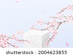 Realistic abstract background with stone square pedestal among pink flowers. Empty podium in minimal style for product demonstration.