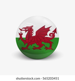 Realistic ball with flag of Wales. Sphere with a reflection of the incident light with shadow.
