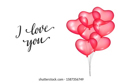 Realistic balloons in the shape of hearts. The inscription i love you.