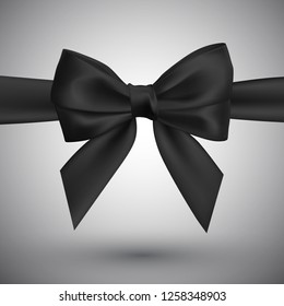 Realistic black bow. Element for decoration gifts, greetings, holidays. Vector illustration.
