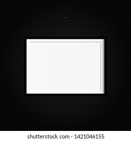 Realistic black frame on the brick wall background. It can be used for presentations.