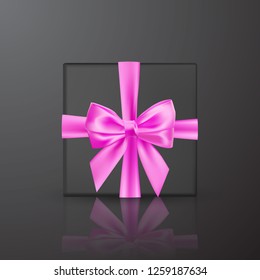Realistic black gift box with pink bow and ribbon. Element for decoration gifts, greetings, holidays. Vector illustration.