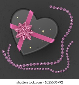 A realistic black gift box with shape of heart decorated with a pink bow, top view. Vector illustration