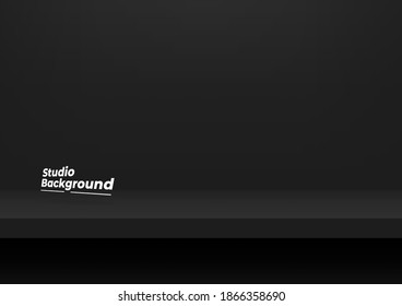 Realistic black shelf on the studio wall. Empty studio black background for product display with copy space.