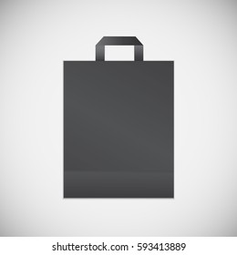 Realistic Black Shopping Bag. Vector.