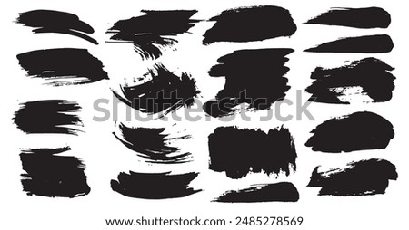 Realistic blak ink brush strokes painted on a white background. Image produced without the use of any form of AI software at any stage.