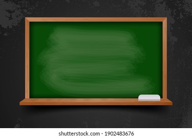 Realistic blank black chalkboard in wooden frame