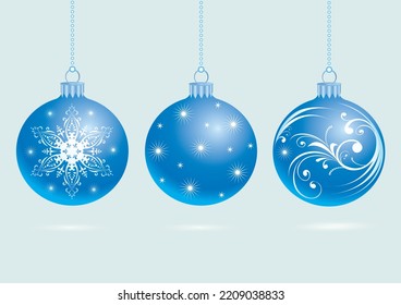 Realistic blue Christmas balls with patterns on a light background	