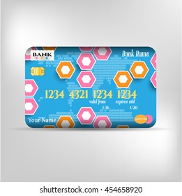 Realistic blue credit card with pattern and text, isolated on bright background