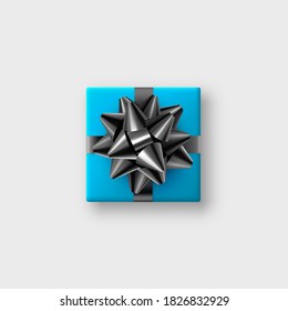 Realistic blue gift box with glittering black bow and ribbon. Decorative design element for holidays. Vector illustration.