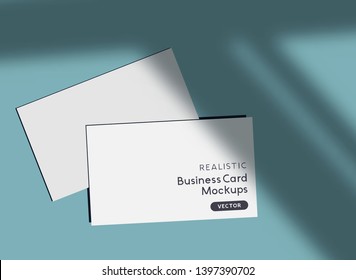 Realistic business card mockup template with vector long shadow effects.