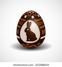 realistic chocolate Easter egg with ornament and rabbit. vector illustration.
