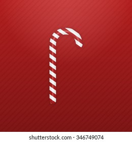 Realistic Christmas sweet Candy Cane on striped red Background. Vector Illustration