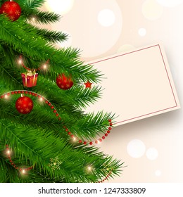 Realistic christmas tree decorated with baubles and lighting garlands on bokeh background with space for your message.