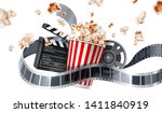 Realistic cinema advertising poster. Popcorn bucket, clapperboard, movie tape and reel, flying popcorn in motion. Film production banner. Movie premiere show announcement design.