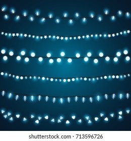 Realistic cold blue Christmas lights vector set. Festive decorative blue light bulbs chains design element collection with transparent shine for Xmas or Halloween design.