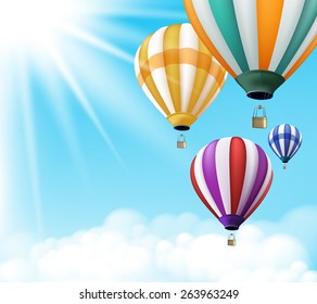 Realistic Colorful Hot Air Balloons Background Flying in the Blue Sky with Sun Rays and Clouds with Space for Writings. Vector Illustration