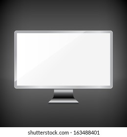 Realistic computer display monitor isolated on dark.