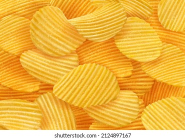 Realistic crispy ripple potato chips background. 3d vector texture with crunchy snack. Delicious food advertising, crisp meal promotion with wavy yellow chips texture top view