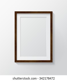 Realistic Dark Wood Blank Picture Frame, hanging on a White Wall from the Front. 
Design Template for Mock Up. Vector illustration
 