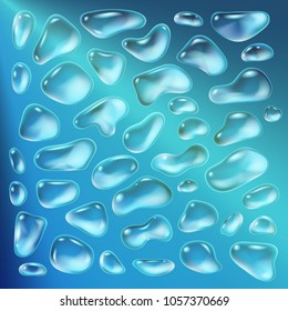 Realistic drops of a rain on a blue background in the form of glass. Abstract set. Vector illustration.
