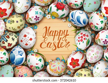 Realistic Easter eggs and flowers on the wooden table. Vector. Holiday background. Frame.  Calligraphy inscription. 