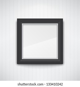 Realistic empty black frame on the white wall. EPS10 vector.