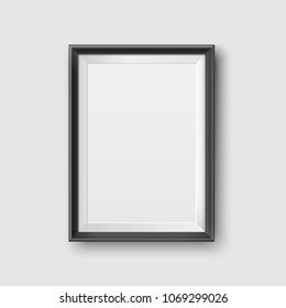 Realistic Empty Black Picture Frame Mockup. Realistic empty black picture frame, isolated on a neutral gray background.