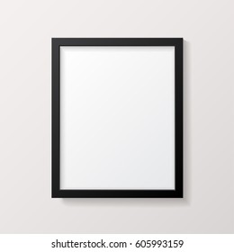 Realistic Empty Black Picture Frame Mockup - Realistic empty black 8x10 picture frame, isolated on a neutral gray background. EPS10 file with transparency.
