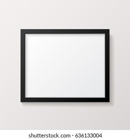 Realistic Empty Black Picture Frame Mockup - Realistic empty black 8x10 picture frame in landscape format. Isolated on a neutral off-white background. EPS10 file with transparency.
