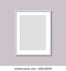 Realistic Empty White Picture Frame. Realistic vertical frame for paintings or photographs hanging on the wall