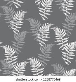 Realistic fern seamless pattern vector illustration. Detailed bracken fern vector, tropical forest, grass herbs growing background. Grey background.