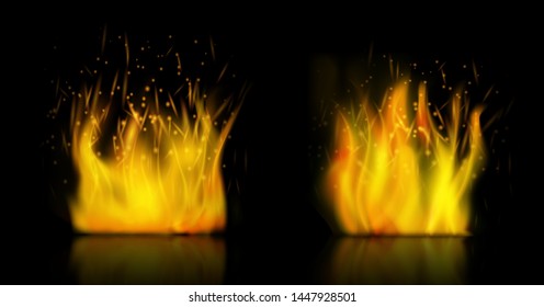 Realistic fire with sparks on dark background. Isolated vector illustration.