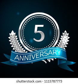 Realistic Five Years Anniversary Celebration Design with Silver Ring and Laurel Wreath, blue ribbon on blue background. Colorful Vector template elements for your birthday celebrating party