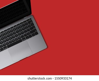 Realistic flatlay laptop isolated on red background. Top view modern computer notebook with empty screen. blank copy space with mobile computer.