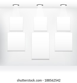 Realistic gallery hall with empty frame on wall 