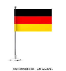 Realistic German table flag on a chrome steel pole. Souvenir from Germany. Desk flag made of paper or fabric and shiny metal stand. Mockup for promotion and advertising. Vector illustration