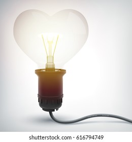 Realistic glowing electric bulb concept in heart shape with power cord on gray background isolated vector illustration